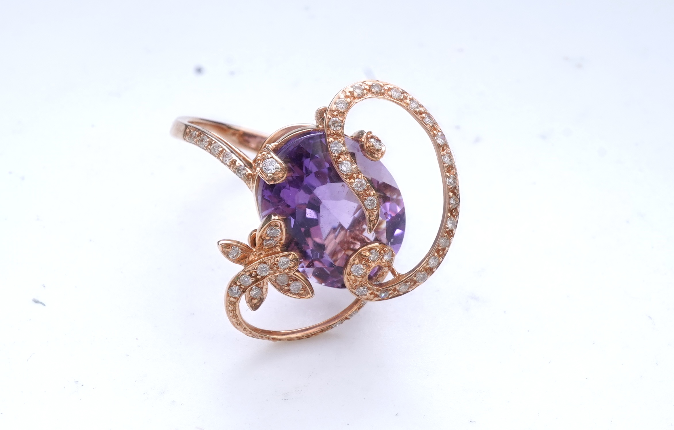 An amethyst and diamond ring
